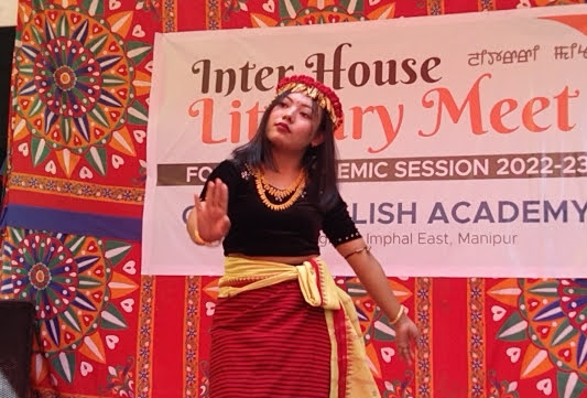 Student performing traditional dance on school litarary meet